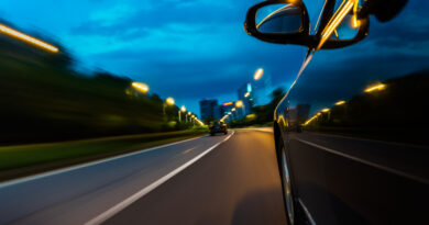 view-from-side-car-going-around-corner-blurred-motion