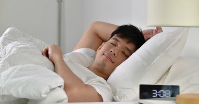 handsome-young-asian-man-sleeping-bed