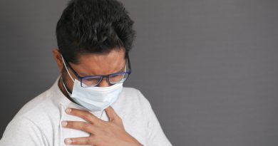 Young Sick Man Coughing Sneezes