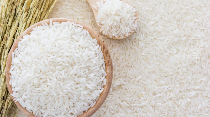 white-rice-bowl-bag-wooden-spoon-rice-plant-white-rice-background